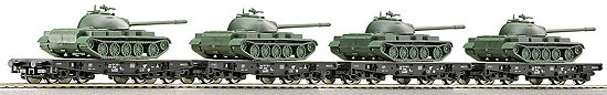 Set of 4 heavy duty flat cars loaded with T55 tanks of East German Army (NVA)<br /><a href='images/pictures/Roco/37584.jpg' target='_blank'>Full size image</a>